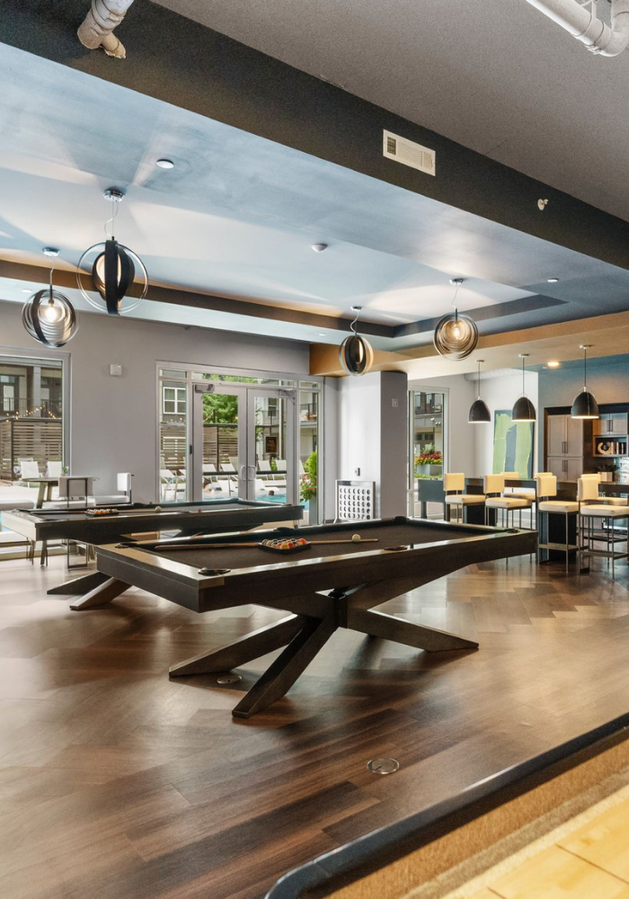500 West Trade Apartments community amenities lounge and pool table