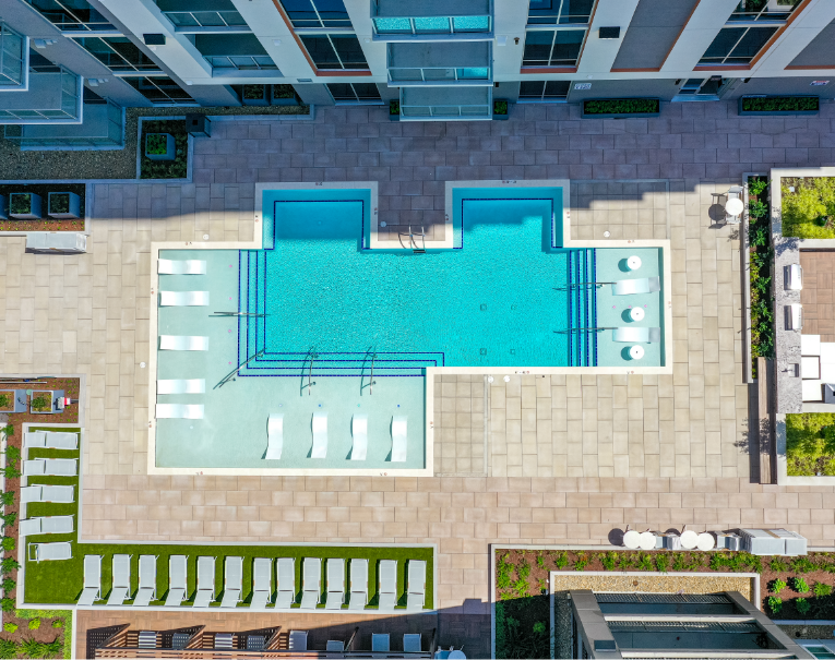 500 West Trade luxury apartments aerial view of community rooftop pool and sky lounge