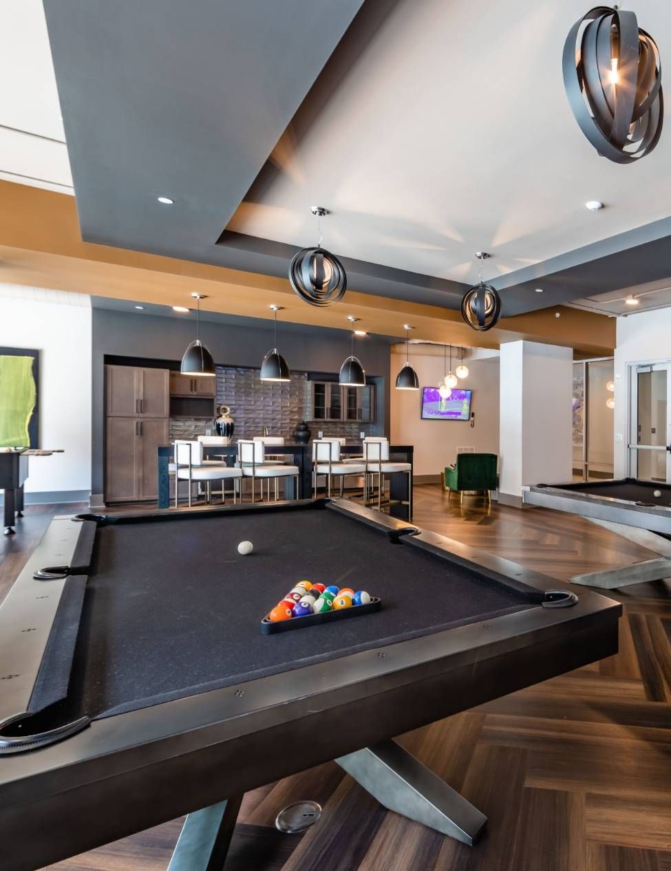 500 West Trade Apartments community amenities lounge and pool table