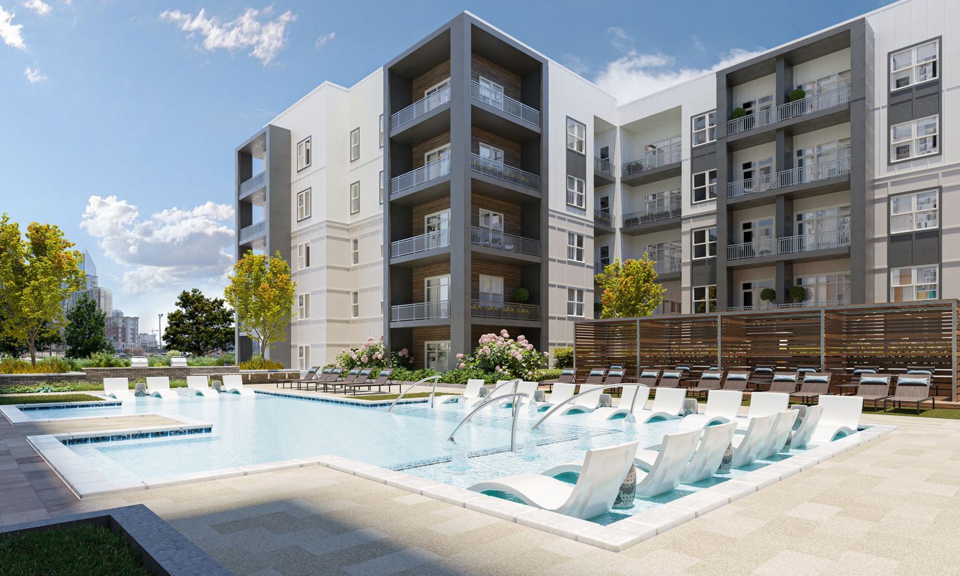 500 West Trade Apartments community amenities sky lounge with bar, bar stools, excellent light, and large windows that look out to the city skyline