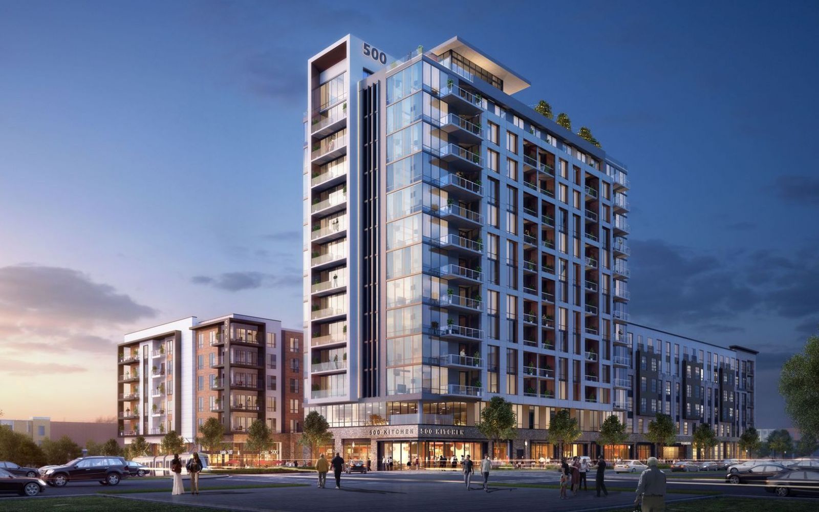 500 West Trade luxury apartments building exterior at dusk