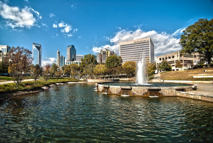 500 West Trade apartments in Charlotte, NC neighborhood beautiful park with fountain and the city skyline in the background