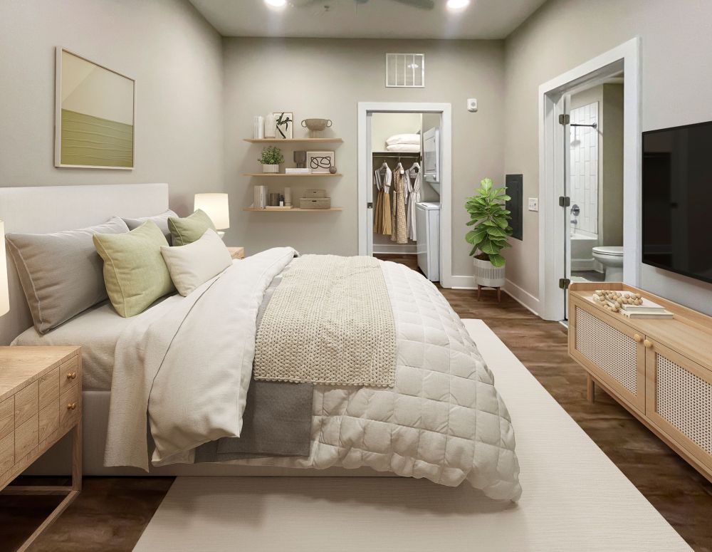 500 West Trade luxury apartment kitchen with island, bar stools, custom cabinets, and faux wood flooring