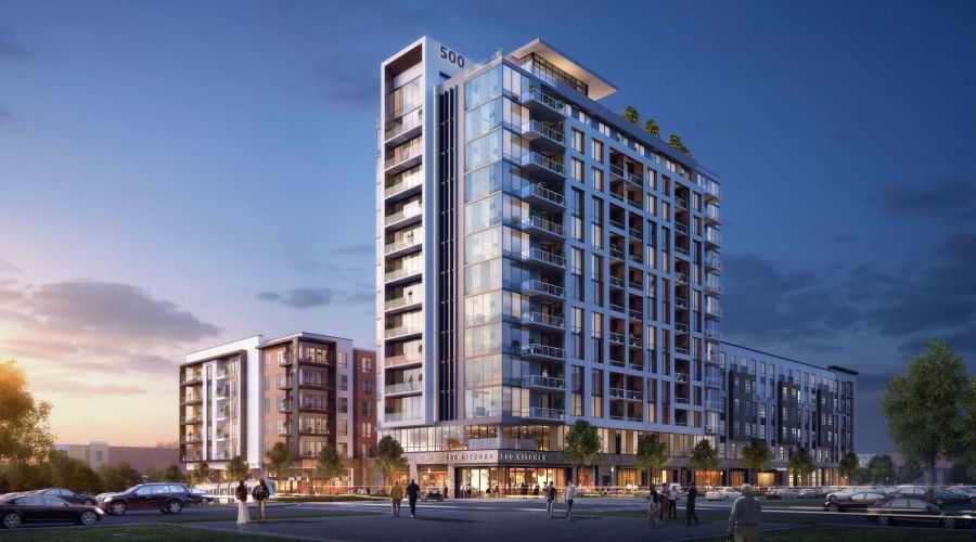 500 West Trade luxury apartments building exterior at dusk